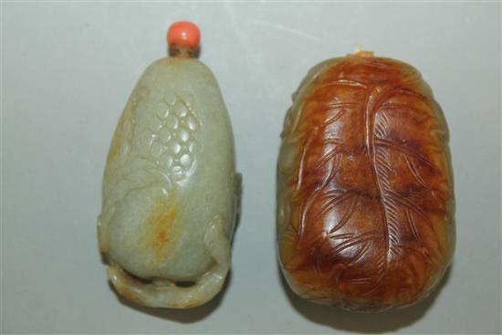 Two Chinese celadon and russet jade snuff bottles, 1800-1900, 5cm, both with coral stoppers